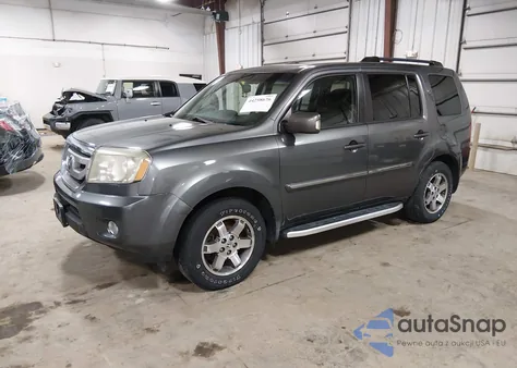2010 Honda Pilot Touring z USA, uszkodzony, nr VIN 5FNYF4H99AB024599